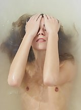 Petite teen Tigra posing naked in bathtub for Alya