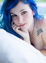 Tattooed blue haired babe stripping panties off her sexy ass