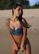 Sexy bikini model Chloe stripping naked on the beach for Hegre
