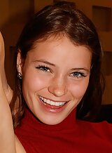 Freckled brunette girl flashing in a restaurant