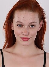 Casting pics of a freckled redhead with small tits