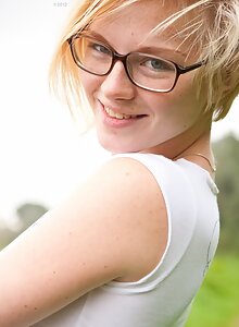 Nerdy blonde with freckles and puffy nipples