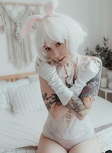 Tattooed alt babe Shakko as the white rabbit teasing in lingerie