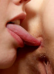 Lesbian couple licking each other