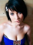 Chick with piercings undressing