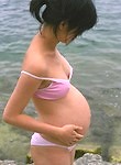 Hairy pregnant Asian nude outdoors