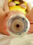 Blonde teen toying with a bottle