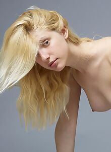 Pale skin Hegre model Alma posing nude in studio shots