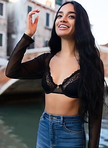 Sexy Latina in a revealing bra shirt in public
