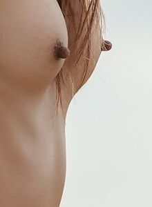 Cute Asian with long nipples takes off her bikini