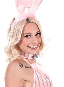 Tattooed blonde Christy White in a sexy bunny outfit