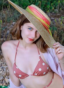Gorgeous blue eyed babe Helana peeling off bikini outdoors in nature