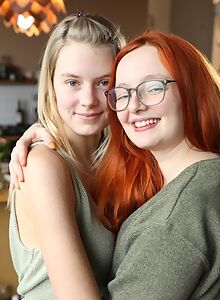Cute blonde lesbian licking her chubby redhead friend