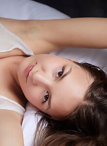 Fresh erotic teen model Bellaria sensually posing nude in bedroom