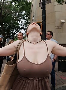 Curvy brunette flashes her ass and big boobs in public