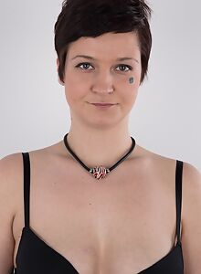 Casting pics of a tattooed brunette with short hair