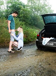 Blonde with small tits fucked in the trunk of a car