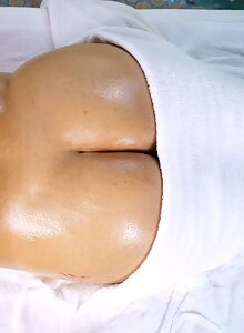 Chubby Latina with huge tits getting massaged