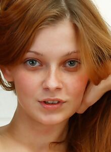 Freckled redhead teenie stripping for you