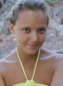 Cute shaved tanned teen nude outdoors