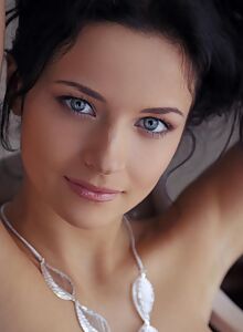 Shaved blue-eyed babe in white stockings