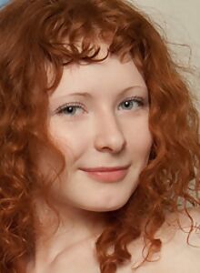 Cute redhead hairy teen posing