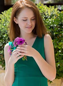 Cute redhead teen takes off her dress