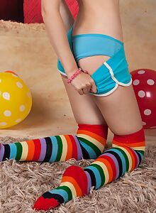 Sexy blonde with blue eyes in striped socks