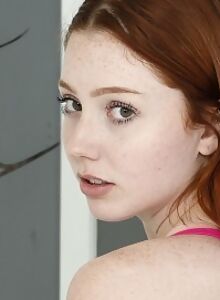 Freckled redhead amateur spreads her holes