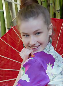 Cute teen Emily Bloom in a geisha uniform