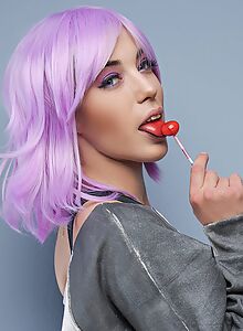 Cosplay babe with purple hair stripping