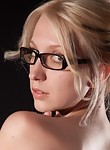 Nerdy blonde shows off her huge natural boobs