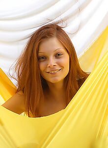 Perfect redhead teen posing naked