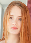 Freckled redhead hottie posing nude
