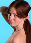 Cute redhead amateur posing nude