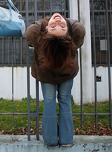 Athletic brunette flashes her tits
