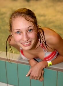 Candid shots of petite blonde Masha in a pool