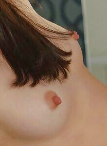 Brunette with big nipples naked in bed