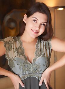 Sexy brunette with firm tits lifts up her dress