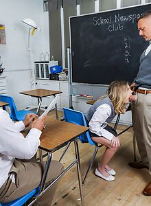Petite blonde schoolgirl fucked by a few guys in the classroom