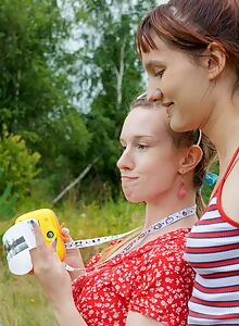 Photo gallery from Club Sweethearts CShaved lesbians licking and fingering each other in a field