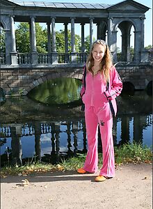 Cute blonde Masha shows off her perfect round ass in stockings