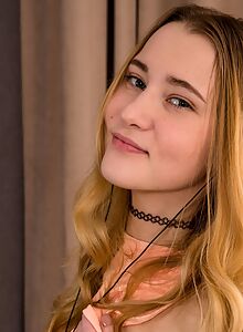 Flat-chested blonde Ivi Rein fingering her shaved pussy