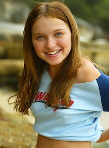 Cutest brunette takes off her bikini at the beach