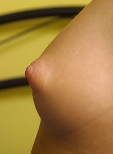 Cute freckled blonde with puffy nipples stripping in bed