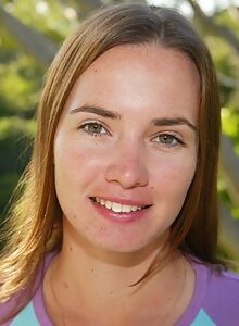 Freckled brunette amateur shows off her firm tits and tan lines