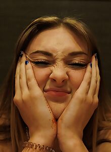 Cute girl with firm tits stripping in her apartment