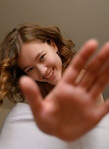 Cute girl with firm tits in see-through lingerie