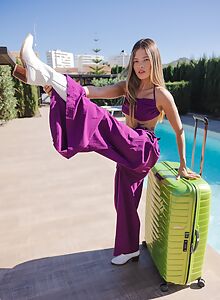 Sexy Latina toying by the pool