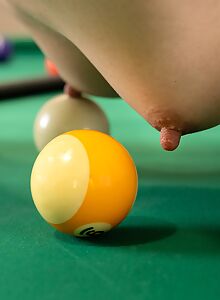 Babe fucks her opponent after a game on top of the pooltable